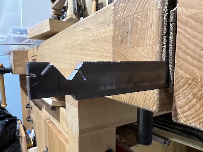 Cuts on the flat bar with a hacksaw